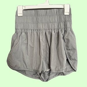 Gray Athletic Shorts with Elastic Waistband and Curved Hem